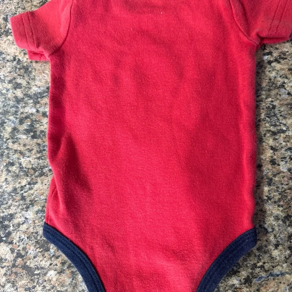 Nike Kids Bodysuit in Red with Blue Trim 0-3M